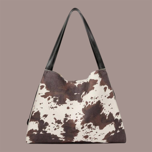Bolso tote estampado efecto vaca con asas negras